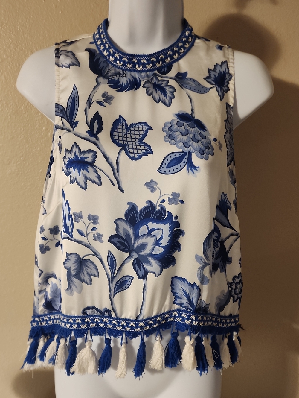 love J White Top with Blue Floral Print and Tassel Hem